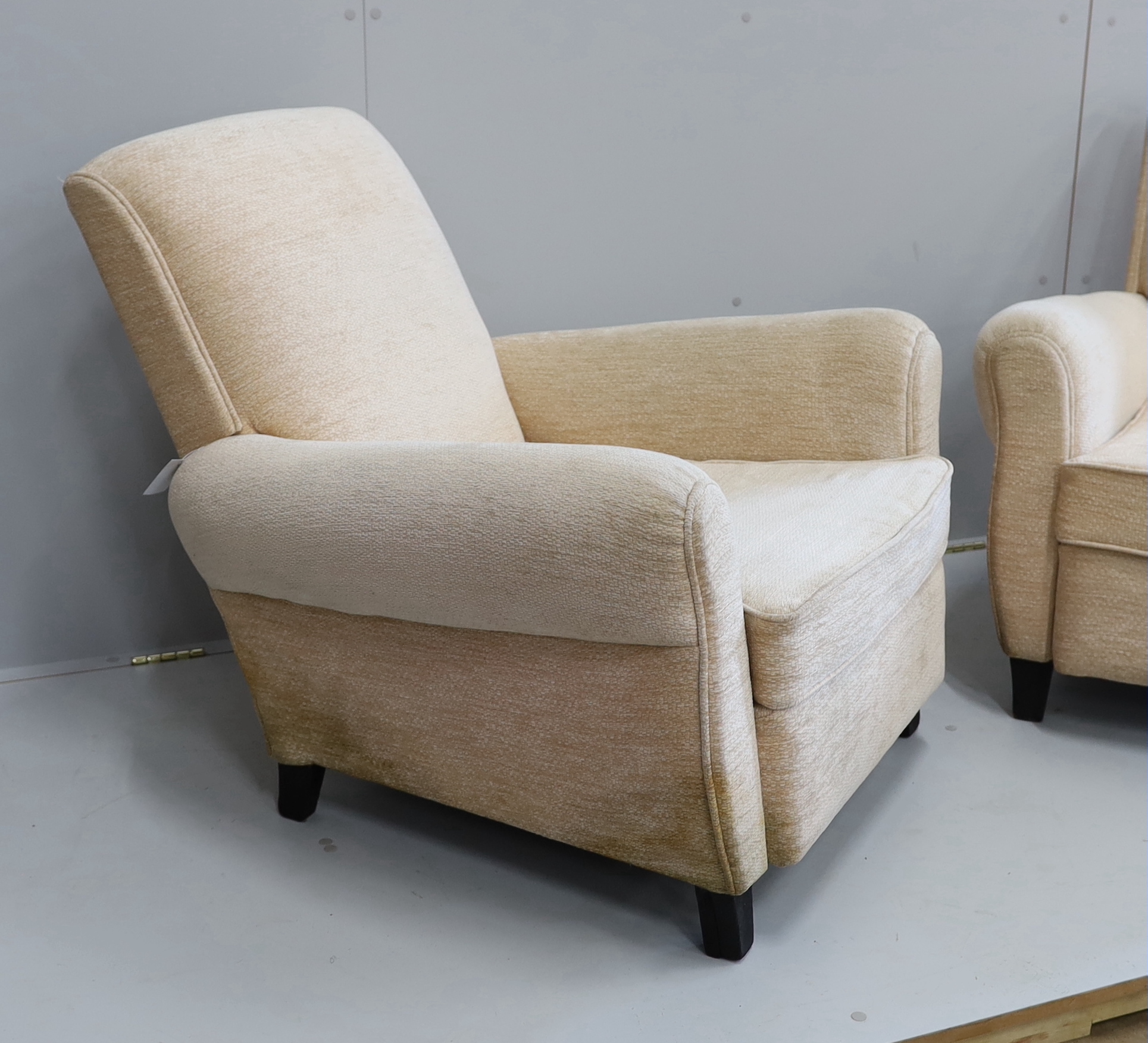 A pair of 1950's Italian armchairs in Bugatti style, width 84cm, depth 86cm, height 78cm